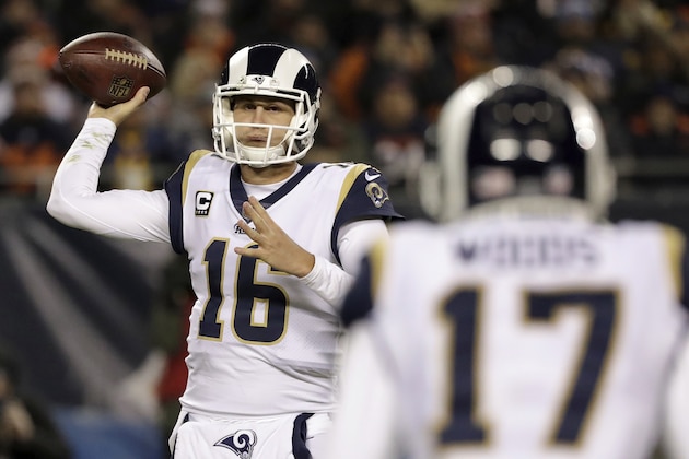 Los Angeles Rams quarterback Jared Goff (16) throws to wide receiver Robert Woods (17) during the first half of an NFL football game against the Chicago Bears Sunday, Dec. 9, 2018, in Chicago. (AP Photo/Nam Y. Huh)