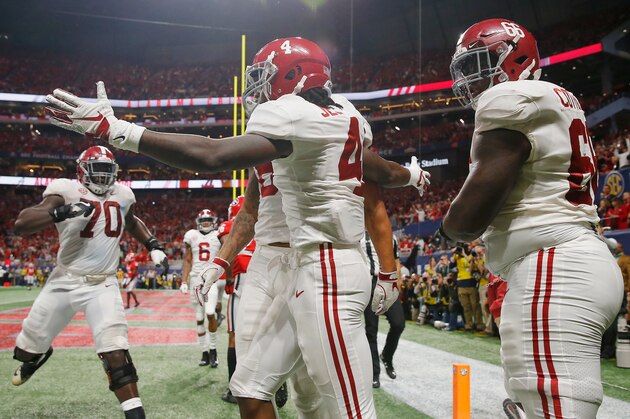 ATLANTA, GA - DECEMBER 01:  Jerry Jeudy #4 of the Alabama Crimson Tide celebrates with teammates after scoring a touchdown against the Georgia Bulldogs in the fourth quarter during the 2018 SEC Championship Game at Mercedes-Benz Stadium on December 1, 2018 in Atlanta, Georgia.  (Photo by Kevin C. Cox/Getty Images)