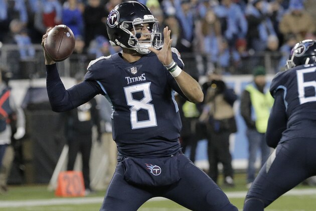 Tennessee Titans quarterback Marcus Mariota (8) works against the Jacksonville Jaguars during the first half of an NFL football game, Thursday, Dec. 6, 2018, in Nashville, Tenn. (AP Photo/James Kenney)