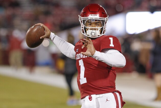 FILE - In this Saturday, Nov. 17, 2018 file photo, Oklahoma quarterback Kyler Murray (1) before the start of an NCAA college football game against Kansas in Norman, Okla. Kyler Murray suddenly has a bunch of new fans in the Oakland Athletics organization, even if they cringe watching Heisman Trophy winner play quarterback for Oklahoma. The A's don't want their prized first-round draft pick hurt on the football field because they are counting on him wearing an Oakland jersey come spring training. (AP Photo/Alonzo Adams, File)