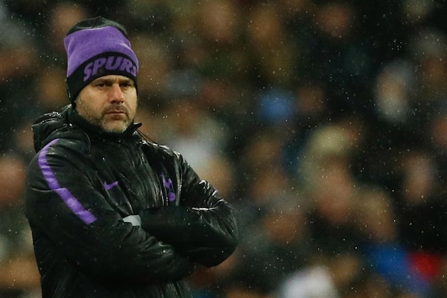 Tottenham Hotspur's Argentinian head coach Mauricio Pochettino looks on during the English Premier League football match between Tottenham Hotspur and Burnley at Wembley Stadium in London on December 15, 2018. (Photo by Adrian DENNIS / AFP) / RESTRICTED TO EDITORIAL USE. No use with unauthorized audio, video, data, fixture lists, club/league logos or 'live' services. Online in-match use limited to 120 images. An additional 40 images may be used in extra time. No video emulation. Social media in-match use limited to 120 images. An additional 40 images may be used in extra time. No use in betting publications, games or single club/league/player publications. /         (Photo credit should read ADRIAN DENNIS/AFP/Getty Images)