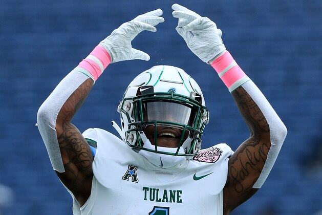 ORLANDO, FLORIDA - DECEMBER 15: Donnie Lewis Jr. #1 of the Tulane Green Wave celebrates during the AutoNation Cure Bowl at Camping World Stadium against Louisiana-Lafayette Ragin Cajuns on December 15, 2018 in Orlando, Florida. (Photo by Sam Greenwood/Getty Images)