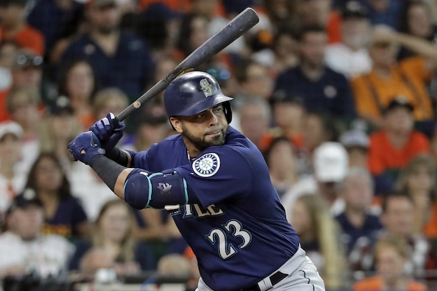 Seattle Mariners' Nelson Cruz (23) bats against the Houston Astros during the third inning of a baseball game Sunday, Aug. 12, 2018, in Houston. (AP Photo/David J. Phillip)