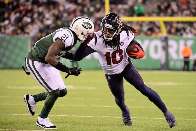 EAST RUTHERFORD, NJ - DECEMBER 15:  Wide receiver DeAndre Hopkins #10 of the Houston Texans makes a first-down reception as he is taclked by cornerback Morris Claiborne #21 of the New York Jets in the first quarter at MetLife Stadium on December 15, 2018 in East Rutherford, New Jersey.  (Photo by Steven Ryan/Getty Images)