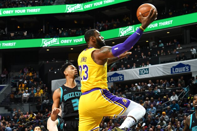 CHARLOTTE, NC - DECEMBER 15:  LeBron James #23 of the Los Angeles Lakers goes to the basket against the Charlotte Hornets on December 15, 2018 at Spectrum Center in Charlotte, North Carolina. NOTE TO USER: User expressly acknowledges and agrees that, by downloading and or using this photograph, User is consenting to the terms and conditions of the Getty Images License Agreement.  Mandatory Copyright Notice:  Copyright 2018 NBAE (Photo by Jesse D. Garrabrant/NBAE via Getty Images)