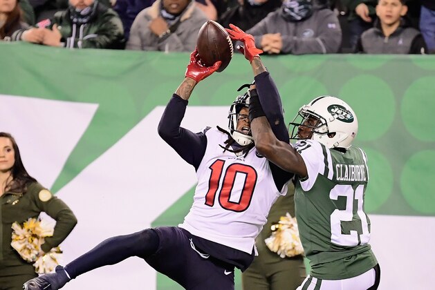 EAST RUTHERFORD, NJ - DECEMBER 15:  Wide receiver DeAndre Hopkins #10 of the Houston Texans makes a catch to score the game-winning touchdown against cornerback Morris Claiborne #21 of the New York Jets during the fourth quarter at MetLife Stadium on December 15, 2018 in East Rutherford, New Jersey. The Houston Texans won 29-22.  (Photo by Steven Ryan/Getty Images)