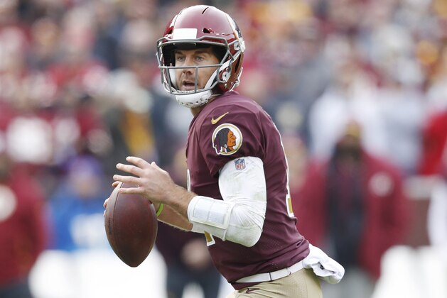 LANDOVER, MD - NOVEMBER 18: Alex Smith #11 of the Washington Redskins looks to pass during the game against the Houston Texans at FedExField on November 18, 2018 in Landover, Maryland. The Texans won 23-21. (Photo by Joe Robbins/Getty Images)