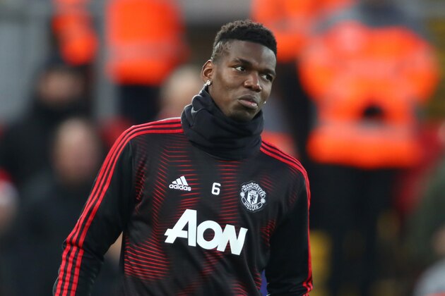 LIVERPOOL, ENGLAND - DECEMBER 16:  Paul Pogba of Manchester United looks on when warming up prior to the Premier League match between Liverpool FC and Manchester United at Anfield on December 16, 2018 in Liverpool, United Kingdom.  (Photo by Clive Brunskill/Getty Images)