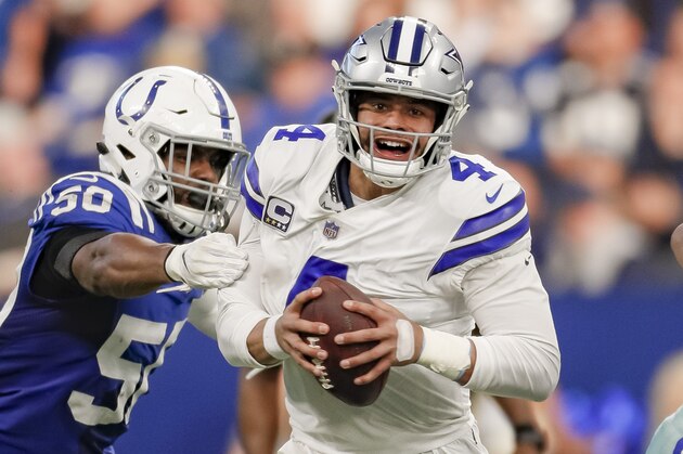 INDIANAPOLIS, IN - DECEMBER 16: Dak Prescott #4 of the Dallas Cowboys tries to escape from the hands of Anthony Walker #50 of the Indianapolis Colts at Lucas Oil Stadium on December 16, 2018 in Indianapolis, Indiana. (Photo by Michael Hickey/Getty Images)