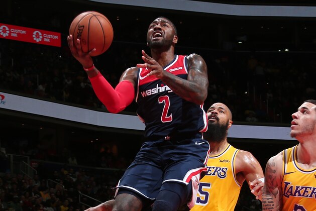 WASHINGTON, DC -  DECEMBER 16: John Wall #2 of the Washington Wizards shoots the ball against the Los Angeles Lakers on December 16, 2018 at Capital One Arena in Washington, DC. NOTE TO USER: User expressly acknowledges and agrees that, by downloading and or using this Photograph, user is consenting to the terms and conditions of the Getty Images License Agreement. Mandatory Copyright Notice: Copyright 2018 NBAE (Photo by Ned Dishman/NBAE via Getty Images)