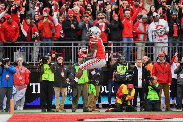 COLUMBUS, OH - NOVEMBER 24:  Mike Weber #5 of the Ohio State Buckeyes celebrates in the end zone after scoring on a two-yard touchdown in the third quarter against the Michigan Wolverines at Ohio Stadium on November 24, 2018 in Columbus, Ohio. Ohio State defeated Michigan 62-39.  (Photo by Jamie Sabau/Getty Images)