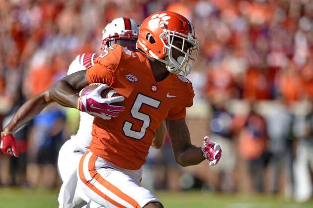 Clemson's Tee Higgins runs in for a touchdown after catching a pass during the first half of an NCAA college football game against North Carolina State, Saturday, Oct. 20, 2018, in Clemson, S.C. (AP Photo/Richard Shiro)