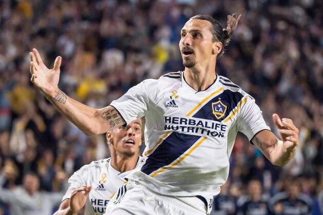 CARSON, CA - SEPTEMBER 29: Zlatan Ibrahimovic #9 of Los Angeles Galaxy celebrates his 2nd goal during the Los Angeles Galaxy's MLS match against Vancouver Whitecaps at the StubHub Center on September 29, 2018 in Carson, California.  The Los Angeles Galaxy won the match 3-0 (Photo by Shaun Clark/Getty Images)