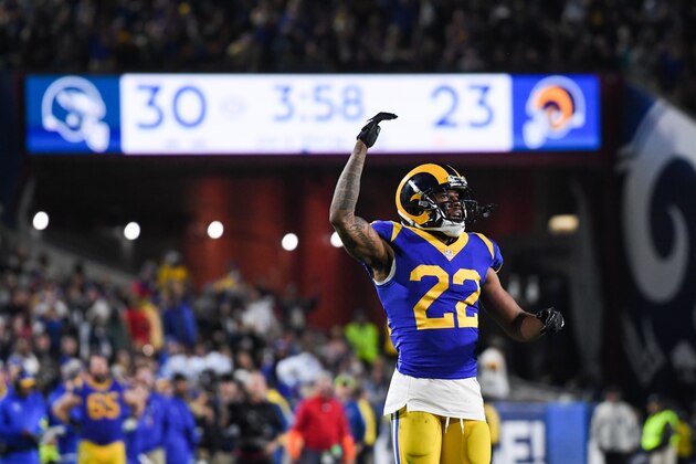 LOS ANGELES, CA - DECEMBER 16: Cornerback Marcus Peters #22 of the Los Angeles Rams urges on the crowd during the fourth quarter against the Philadelphia Eagles at Los Angeles Memorial Coliseum on December 16, 2018 in Los Angeles, California. (Photo by Harry How/Getty Images)