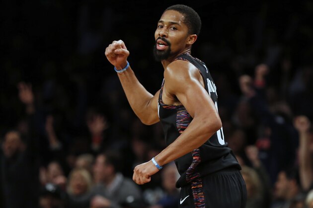 Brooklyn Nets guard Spencer Dinwiddie reacts against the Washington Wizards during the second half of an NBA basketball game Friday, Dec. 14, 2018, in New York. The Nets won 125-118. (AP Photo/Adam Hunger)