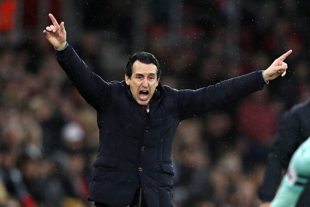 Arsenal's Spanish head coach Unai Emery gestures on the touchline during the English Premier League football match between Southampton and Arsenal at St Mary's Stadium in Southampton, southern England on December 16, 2018. (Photo by Adrian DENNIS / AFP) / RESTRICTED TO EDITORIAL USE. No use with unauthorized audio, video, data, fixture lists, club/league logos or 'live' services. Online in-match use limited to 120 images. An additional 40 images may be used in extra time. No video emulation. Social media in-match use limited to 120 images. An additional 40 images may be used in extra time. No use in betting publications, games or single club/league/player publications. /         (Photo credit should read ADRIAN DENNIS/AFP/Getty Images)