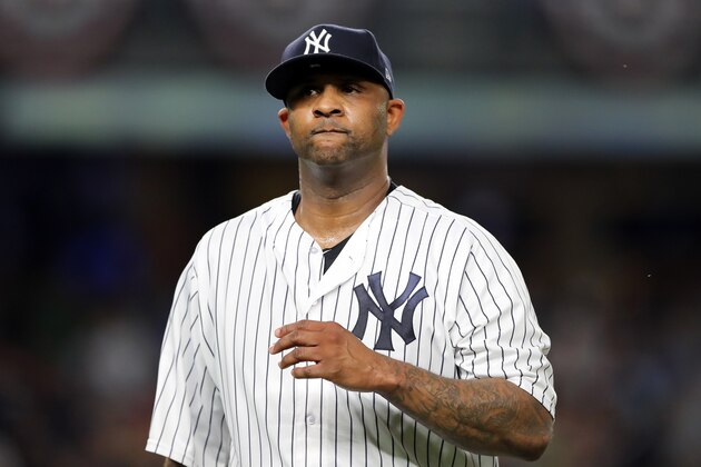 NEW YORK, NEW YORK - OCTOBER 09:  CC Sabathia #52 of the New York Yankees walks back to the dugout after giving up three runs in the third inning against the Boston Red Sox during Game Four American League Division Series at Yankee Stadium on October 09, 2018 in the Bronx borough of New York City. (Photo by Elsa/Getty Images)
