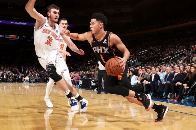 NEW YORK, NY - DECEMBER 17: Devin Booker #1 of the Phoenix Suns drives to the basket against the New York Knicks on December 17, 2018 at Madison Square Garden in New York City, New York. NOTE TO USER: User expressly acknowledges and agrees that, by downloading and or using this photograph, User is consenting to the terms and conditions of the Getty Images License Agreement. Mandatory Copyright Notice: Copyright 2018 NBAE  (Photo by Nathaniel S. Butler/NBAE via Getty Images)