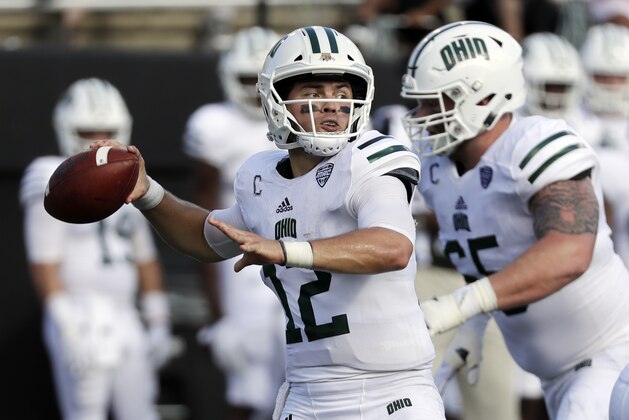 Ohio quarterback Nathan Rourke (12) passes against Virginia in the first half of an NCAA college football game Saturday, Sept. 15, 2018, in Nashville, Tenn. (AP Photo/Mark Humphrey)