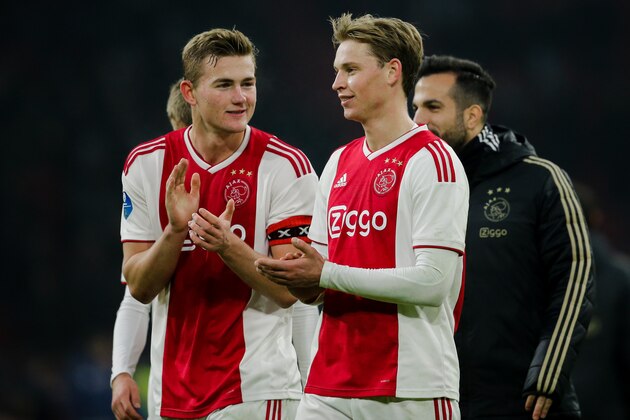 AMSTERDAM, NETHERLANDS - DECEMBER 16: (L-R) Matthijs de Ligt of Ajax, Frenkie de Jong of Ajax, celebrate the victory after the game during the Dutch Eredivisie  match between Ajax v De Graafschap at the Johan Cruijff Arena on December 16, 2018 in Amsterdam Netherlands (Photo by Erwin Spek/Soccrates/Getty Images)