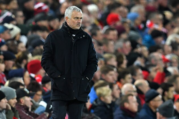 Manchester United's Portuguese manager Jose Mourinho watches from the touchline during the English Premier League football match between Liverpool and Manchester United at Anfield in Liverpool, north west England on December 16, 2018. (Photo by Paul ELLIS / AFP) / RESTRICTED TO EDITORIAL USE. No use with unauthorized audio, video, data, fixture lists, club/league logos or 'live' services. Online in-match use limited to 120 images. An additional 40 images may be used in extra time. No video emulation. Social media in-match use limited to 120 images. An additional 40 images may be used in extra time. No use in betting publications, games or single club/league/player publications. /         (Photo credit should read PAUL ELLIS/AFP/Getty Images)