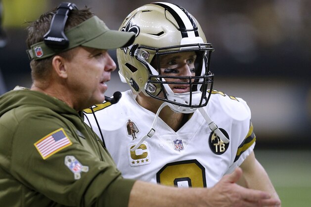 NEW ORLEANS, LA - NOVEMBER 18:  Drew Brees #9 of the New Orleans Saints and head coach Sean Payton talk during a game against the Philadelphia Eagles at the Mercedes-Benz Superdome on November 18, 2018 in New Orleans, Louisiana.  (Photo by Jonathan Bachman/Getty Images)