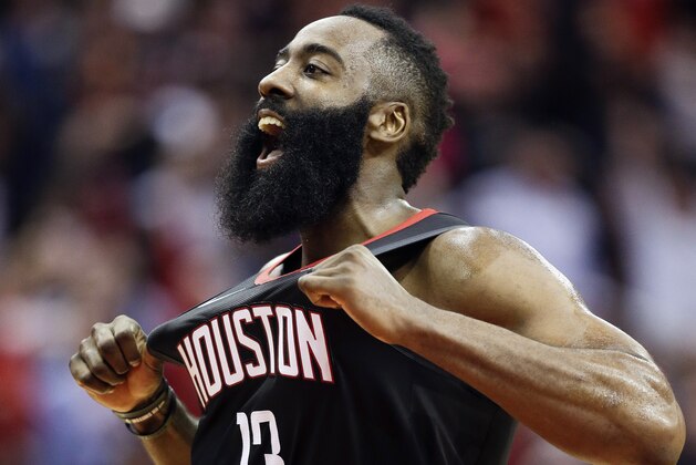 Houston Rockets guard James Harden reacts after making a three-point basket late in the second half of an NBA basketball game against the Utah Jazz, Monday, Dec. 17, 2018, in Houston. (AP Photo/Eric Christian Smith)