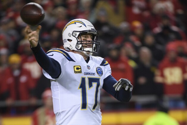 Los Angeles Chargers quarterback Philip Rivers (17) throws against the Kansas City Chiefs during an NFL football game in Kansas City, Mo., Thursday, Dec. 13, 2018. (AP Photo/Reed Hoffmann)