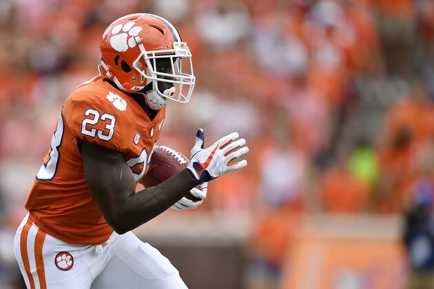 CLEMSON, SC - SEPTEMBER 29: Running back Lyn-J Dixon #23 of the Clemson Tigers runs in the open field against the Syracuse Orange during the football game at Clemson Memorial Stadium on September 29, 2018 in Clemson, South Carolina. (Photo by Mike Comer/Getty Images)