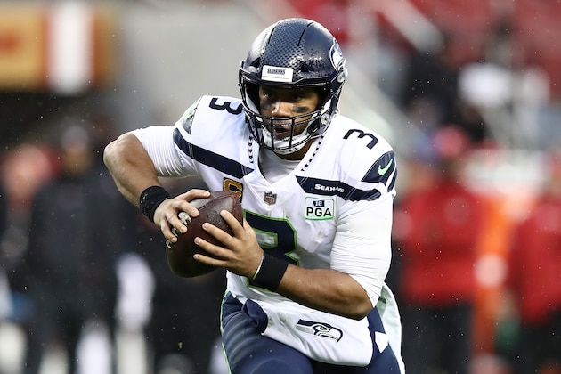 SANTA CLARA, CA - DECEMBER 16: Russell Wilson #3 of the Seattle Seahawks scrambles with the ball against the San Francisco 49ers during their NFL game at Levi's Stadium on December 16, 2018 in Santa Clara, California. (Photo by Ezra Shaw/Getty Images)