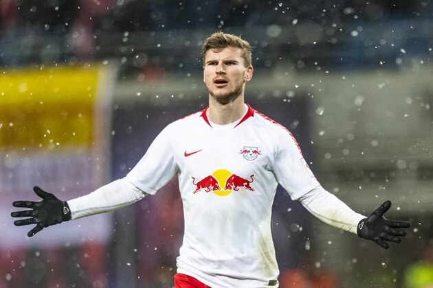 Leipzig's German forward Timo Werner celebrates scoring the fourth goal during the German first division Bundesliga football match between RB Leipzig and FSV Mainz in Leipzig, eastern Germany on December 16, 2018. (Photo by ROBERT MICHAEL / AFP) / DFL REGULATIONS PROHIBIT ANY USE OF PHOTOGRAPHS AS IMAGE SEQUENCES AND/OR QUASI-VIDEO        (Photo credit should read ROBERT MICHAEL/AFP/Getty Images)