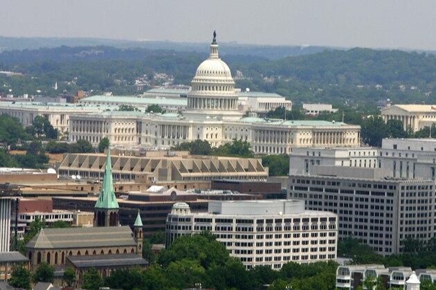 OVER WASHINGTON, UNITED STATES:  The US Capital and the Washington, DC, skyline, are seen in this 16 May 2005 aerial photo.  AFP Photo/Paul J. RICHARDS  (Photo credit should read PAUL J.RICHARDS/AFP/Getty Images)