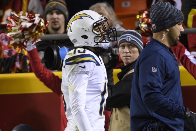 Los Angeles Chargers wide receiver Keenan Allen (13) leaves the field after being injured in an NFL football game in Kansas City, Mo., Thursday, Dec. 13, 2018. (AP Photo/Reed Hoffmann)