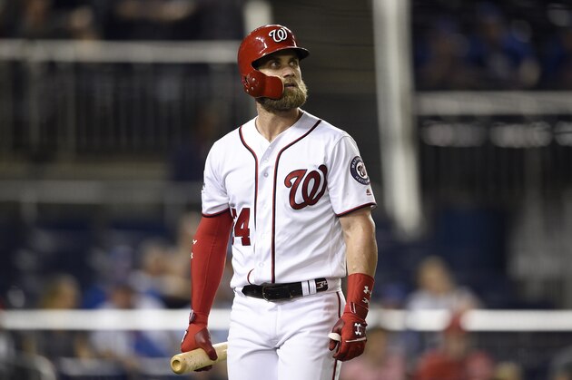 Washington Nationals' Bryce Harper reacts after he was called out on strikes during the tenth inning of a baseball game against the Chicago Cubs, Thursday, Sept. 6, 2018, in Washington. The Cubs won 6-4 in extra innings. (AP Photo/Nick Wass)