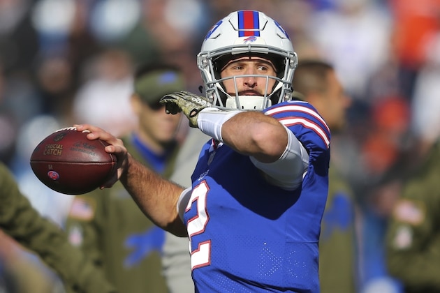 FILE - In this  Sunday, Nov. 4, 2018 file photo, Buffalo Bills quarterback Nathan Peterman (2) warms up before an NFL football game against the Chicago Bears in Orchard Park, N.Y. Nathan Peterman's turnover-over prone days with the Buffalo Bills are over after the second-year player was cut by the team on Monday, Nov. 12, 2018. The move was announced as the Bills (3-7) enter their bye week, and not long after coach Sean McDermott backed Peterman earlier in the day.  (AP Photo/Jeffrey T. Barnes, File)