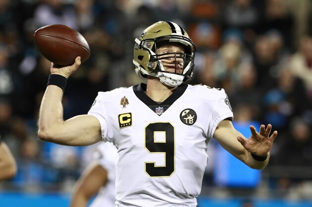 FILE - In this Dec. 17, 2018 file photo New Orleans Saints' Drew Brees (9) looks to pass against the Carolina Panthers in the first half of an NFL football game in Charlotte, N.C. Brees is the starting quarterback for the NFC backed by Green Bay’s Aaron Rodgers and the Rams’ Jared Goff for the Pro Bowl which will be played Jan. 27 in Orlando. (AP Photo/Jason E. Miczek, file)