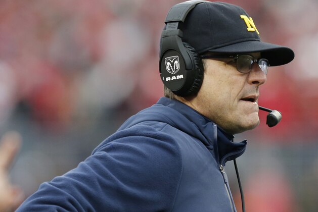 Michigan head coach Jim Harbaugh watches his team from the sidelines during the first half of their an NCAA college football game against Ohio State, Saturday, Nov. 24, 2018, in Columbus, Ohio. (AP Photo/Jay LaPrete)