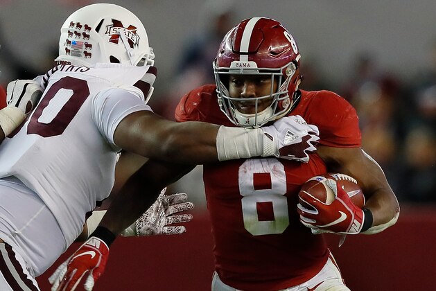 TUSCALOOSA, AL - NOVEMBER 10:  Josh Jacobs #8 of the Alabama Crimson Tide is tackled by Grant Harris #90 of the Mississippi State Bulldogs at Bryant-Denny Stadium on November 10, 2018 in Tuscaloosa, Alabama.  (Photo by Kevin C. Cox/Getty Images)
