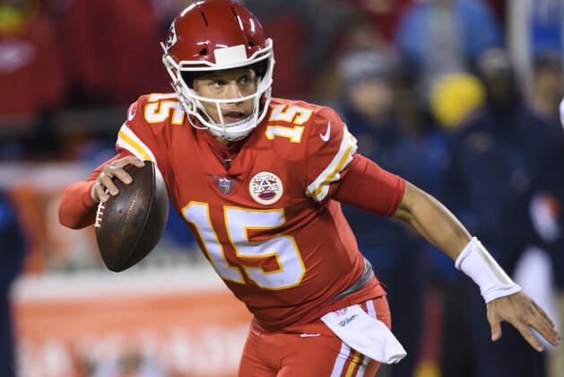 Kansas City Chiefs quarterback Patrick Mahomes (15) scrambles during an NFL football game in Kansas City, Mo., Thursday, Dec. 13, 2018. (AP Photo/Reed Hoffmann)
