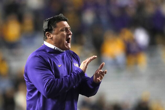 LSU head coach Ed Orgeron calls out from the sideline in the second half of an NCAA college football game against Rice in Baton Rouge, La., Saturday, Nov. 17, 2018. (AP Photo/Gerald Herbert)