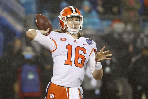 CHARLOTTE, NC - DECEMBER 01:  Trevor Lawrence #16 of the Clemson Tigers drops back to pass against the Pittsburgh Panthers during their game at Bank of America Stadium on December 1, 2018 in Charlotte, North Carolina.  (Photo by Streeter Lecka/Getty Images)