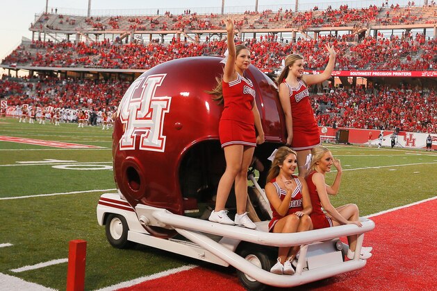 HOUSTON, TX - SEPTEMBER 29: Houston Cougar cheerleaders perform on September 29, 2016 in Houston, Texas.  (Photo by Bob Levey/Getty Images)