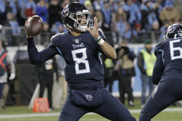 Tennessee Titans quarterback Marcus Mariota (8) works against the Jacksonville Jaguars during the first half of an NFL football game, Thursday, Dec. 6, 2018, in Nashville, Tenn. (AP Photo/James Kenney)