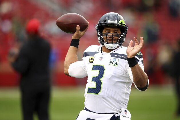 Seattle Seahawks quarterback Russell Wilson warms up before an NFL football game against the San Francisco 49ers in Santa Clara, Calif., Sunday, Dec. 16, 2018. (AP Photo/Ben Margot)