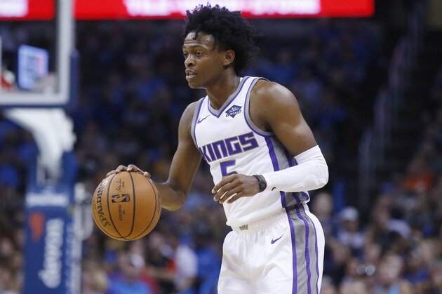 Sacramento Kings guard De'Aaron Fox (5) during an NBA basketball game between the Sacramento Kings and the Oklahoma City Thunder in Oklahoma City, Sunday, Oct. 21, 2018. (AP Photo/Sue Ogrocki)
