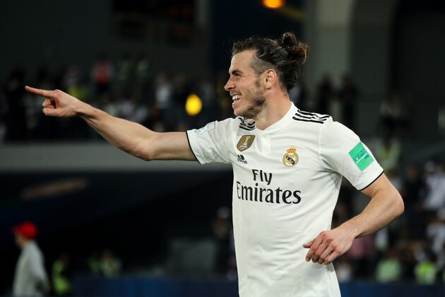 ABU DHABI, UNITED ARAB EMIRATES - DECEMBER 19: Gareth Bale of Real Madrid celebrates after scoring a goal to make it 0-3 during the FIFA Club World Cup UAE 2018 Semi Final match between Kashima Antlers and Real Madrid at Sheikh Zayed Sports City Stadium on December 19, 2018 in Abu Dhabi, United Arab Emirates. (Photo by Matthew Ashton - AMA/Getty Images)