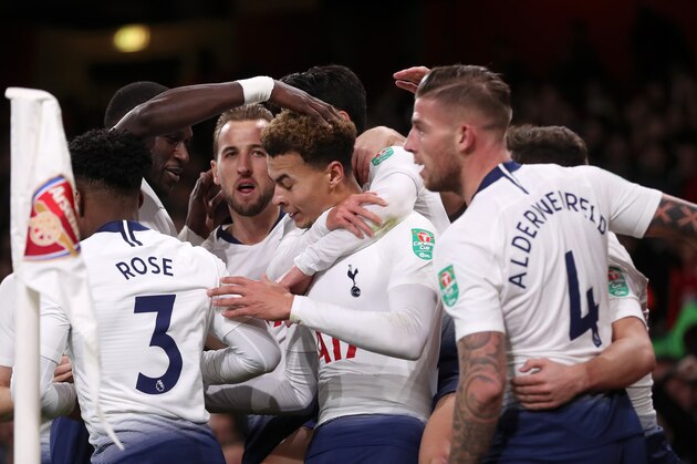 LONDON, ENGLAND - DECEMBER 19:  Dele Alli of Tottenham Hotspur celebrates with teammates after scoring his team's second goal during the Carabao Cup Quarter Final match between Arsenal and Tottenham Hotspur at Emirates Stadium on December 19, 2018 in London, United Kingdom.  (Photo by Alex Morton/Getty Images)