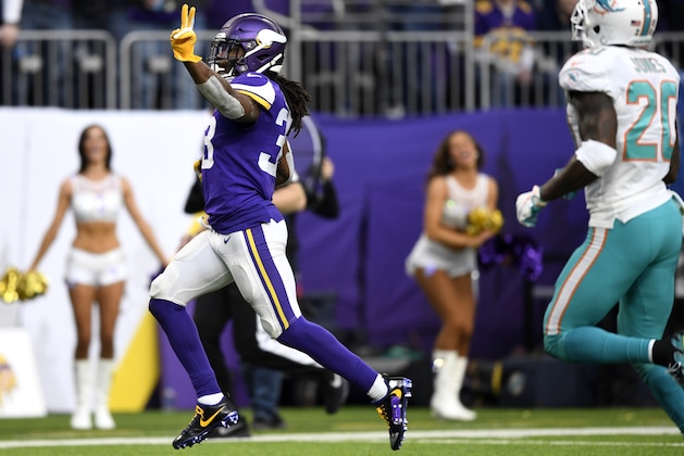 MINNEAPOLIS, MN - DECEMBER 16: Dalvin Cook #33 of the Minnesota Vikings runs with the ball for his second touchdown of the game in the fourth quarter against the Miami Dolphins at U.S. Bank Stadium on December 16, 2018 in Minneapolis, Minnesota. (Photo by Hannah Foslien/Getty Images)