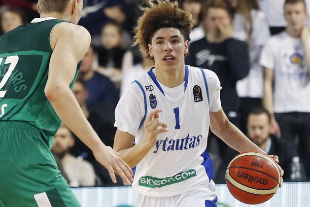 FILE - In this Jan. 9, 2018, file photo, BC Prienu Vytautas's LaMelo Ball is shown in action during the Big Baller Brand Challenge friendly tournament match against BC Zalgiris-2 in Prienai, Lithuania. LaMelo Ball, the brother of Los Angeles Lakers guard Lonzo Ball, has been ejected from a game in Lithuania after striking an opponent. Ball clashed with Lithuanian player Mindaugas Susinskas during Monday's, Oct. 1, 2018, exhibition game between local club Dzukija and a touring team of United States players from the Junior Basketball Association established by the Ball brothers' father, LaVar Ball. (AP Photo/Liusjenas Kulbis, File)