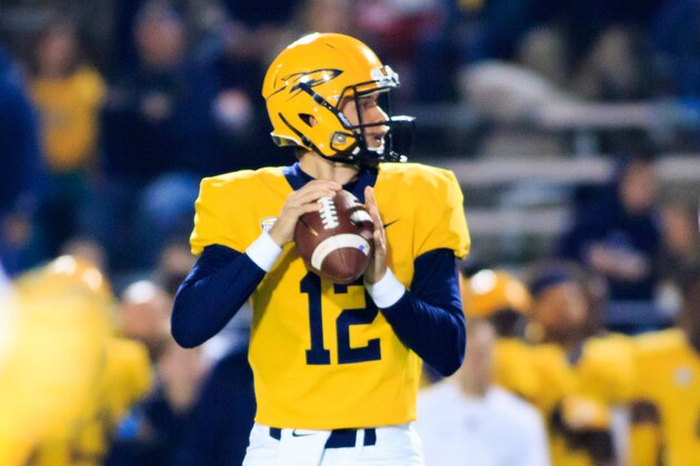 TOLEDO, OH - OCTOBER 31: Eli Peters #12 of the Toledo Rockets throws a pass in the game against the Ball State Cardinals on October 31, 2018 in Toledo, Ohio. (Photo by Justin Casterline/Getty Images)
